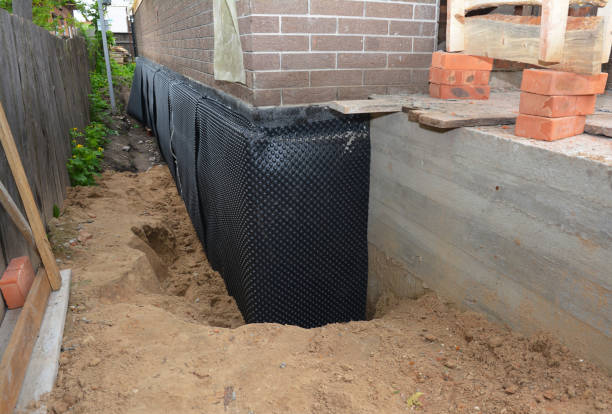SJ Waterproofing Pros technician performing targeted Sump Pump Installation assessment in Mableton, GA
